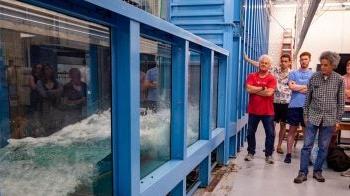 Roberto Camassa (left) and Rich McLaughlin (right) give a tour of the UNC Fluids Lab.